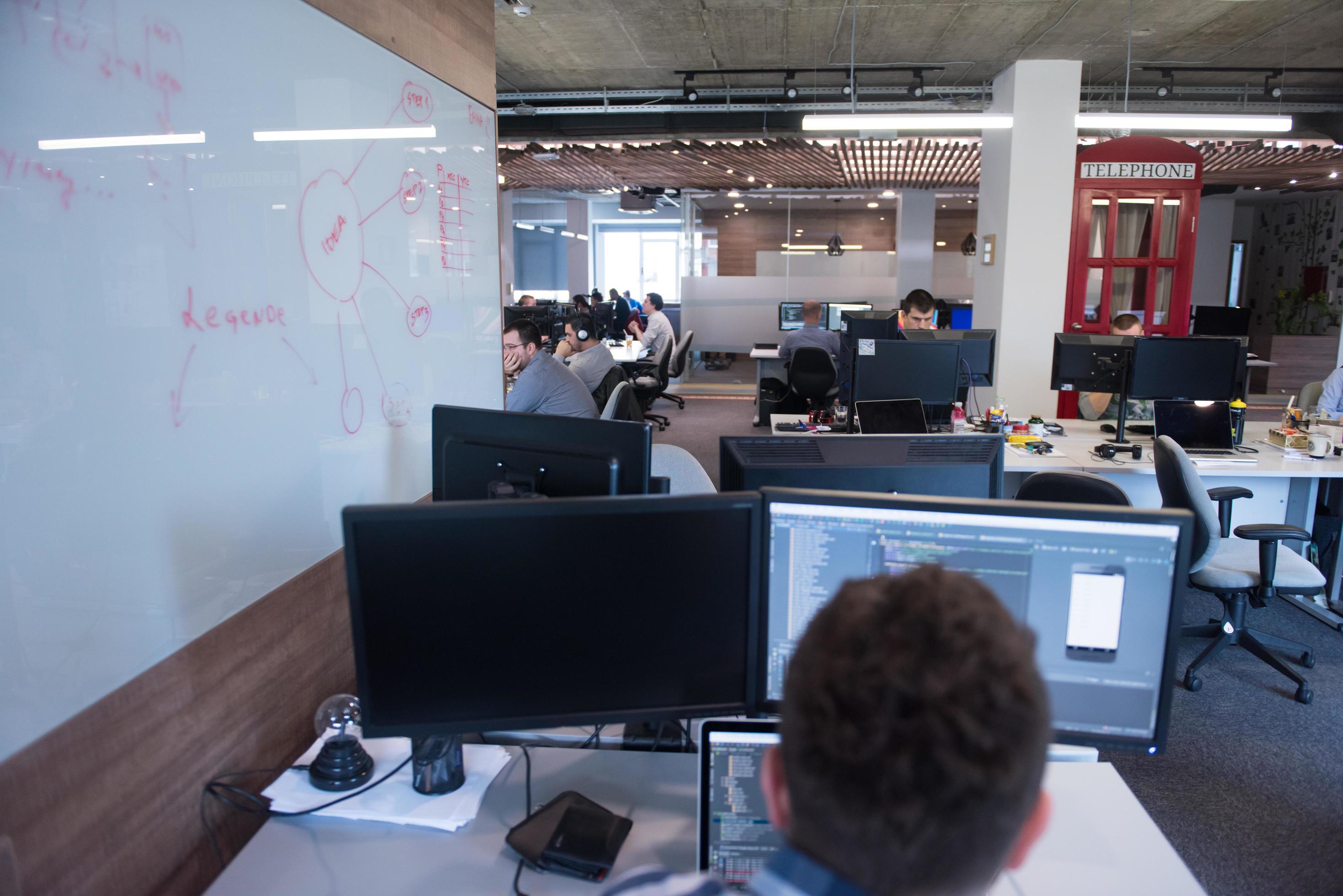 young programmers writing programming code 12535210 Stock Photo at Vecteezy