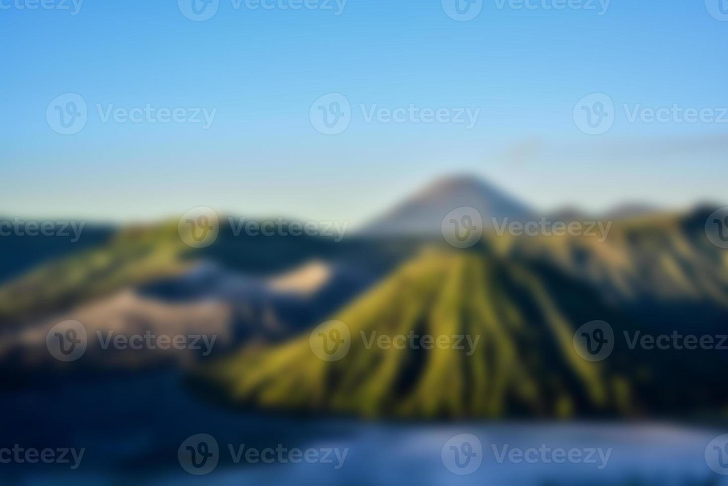 Blurred View of mount bromo at sunrise. Blur mountain background and nature landscape photo