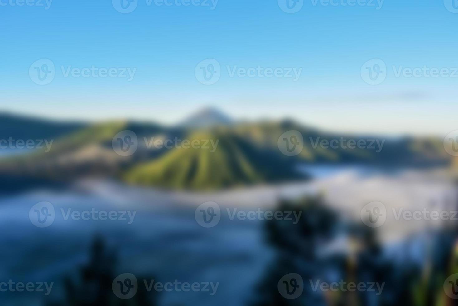 Blurred View of mount bromo at sunrise. Blur mountain background and nature landscape photo