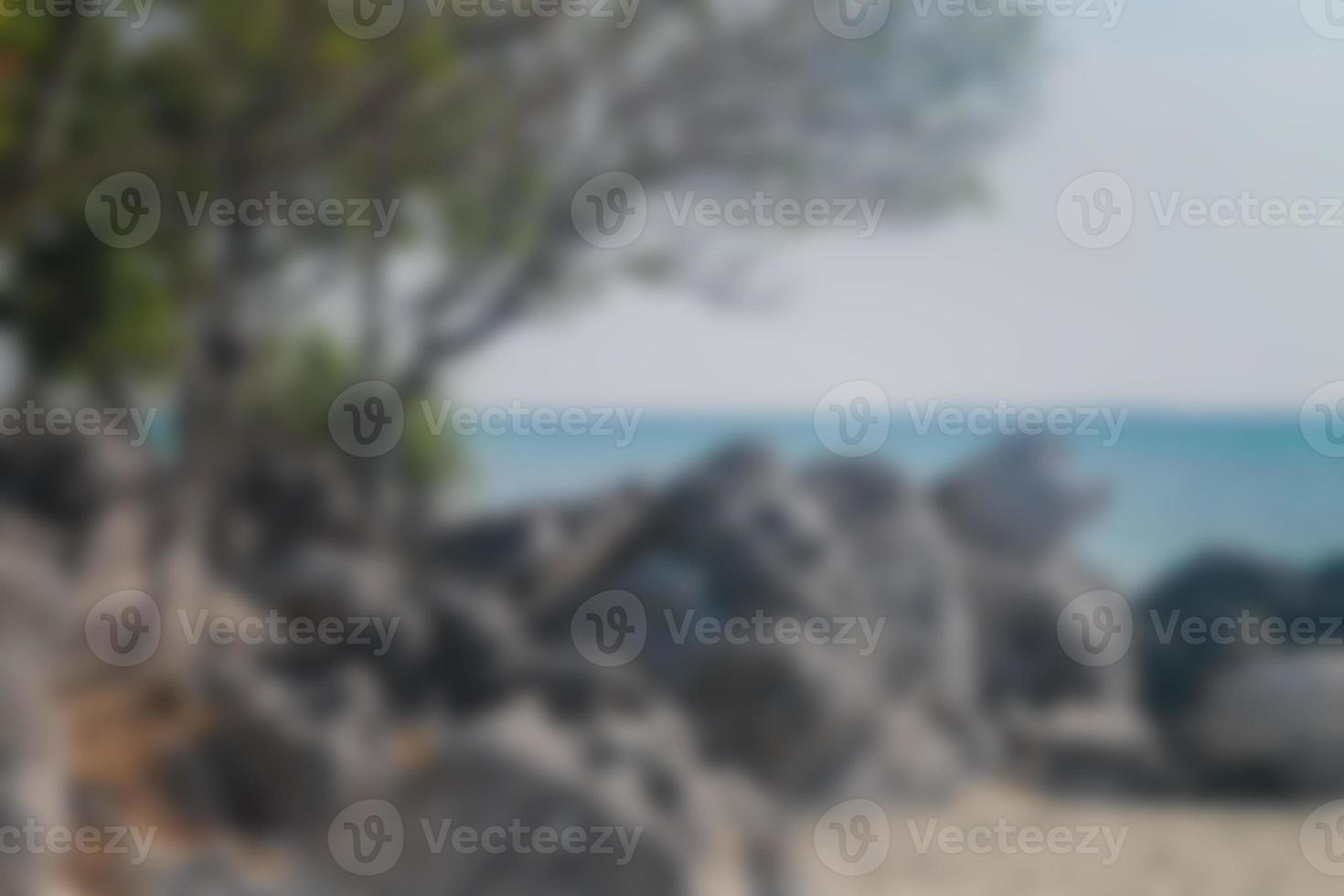 Blurred background, view tropical beach with sun light wave abstract background. Travel concept. photo