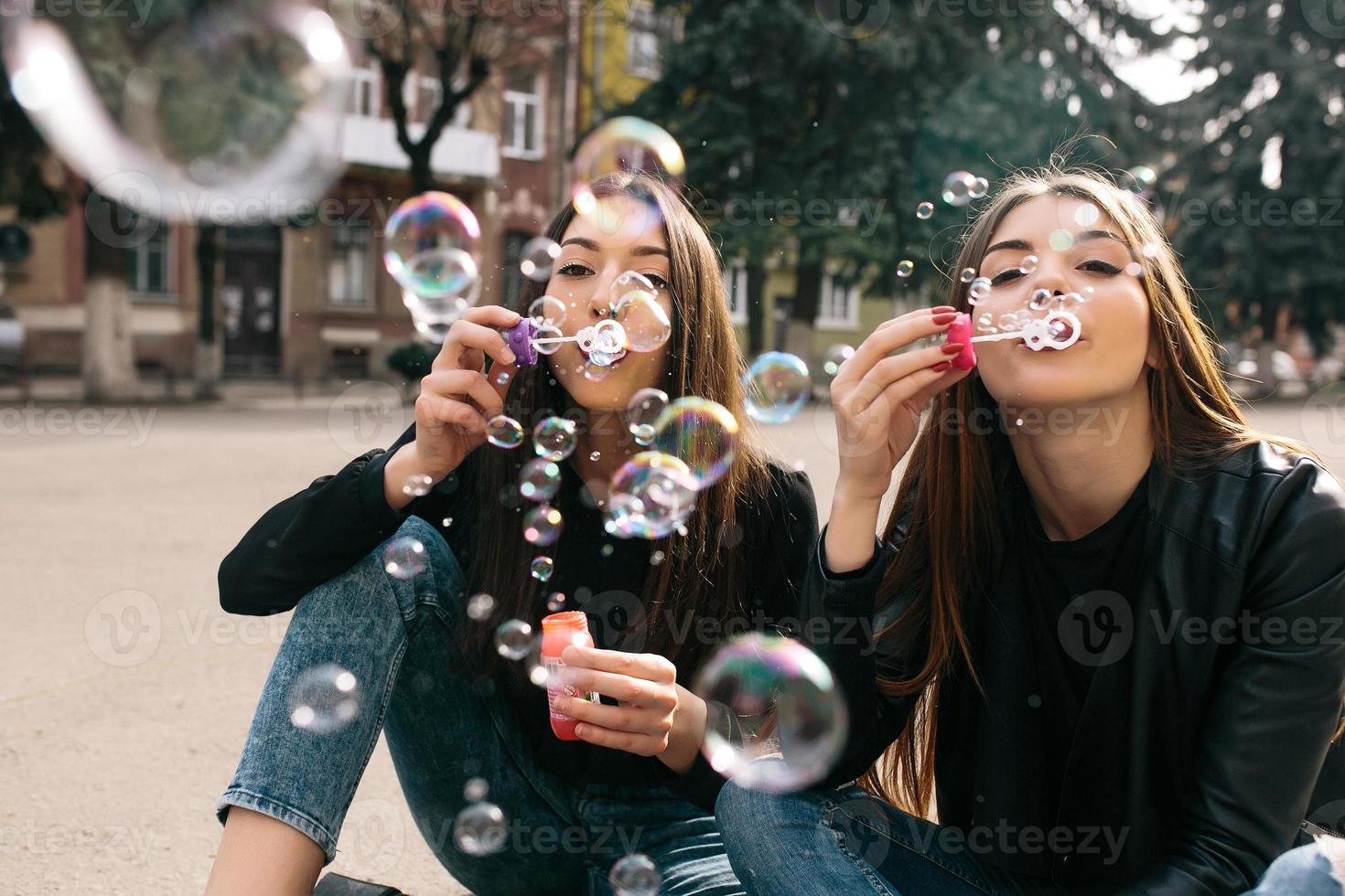 Two young adult girls photo