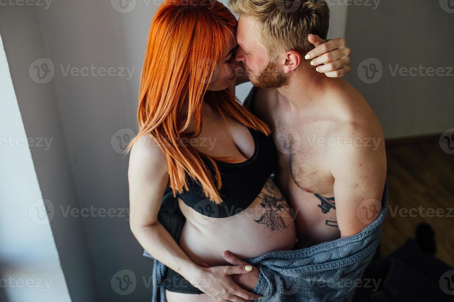 Pregnant couple portrait photo
