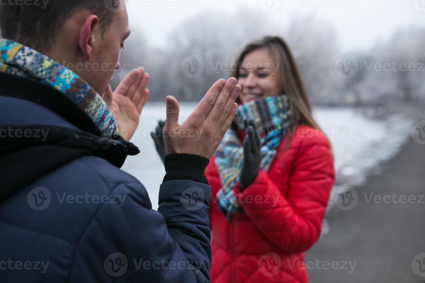 Couple in winter landscape photo