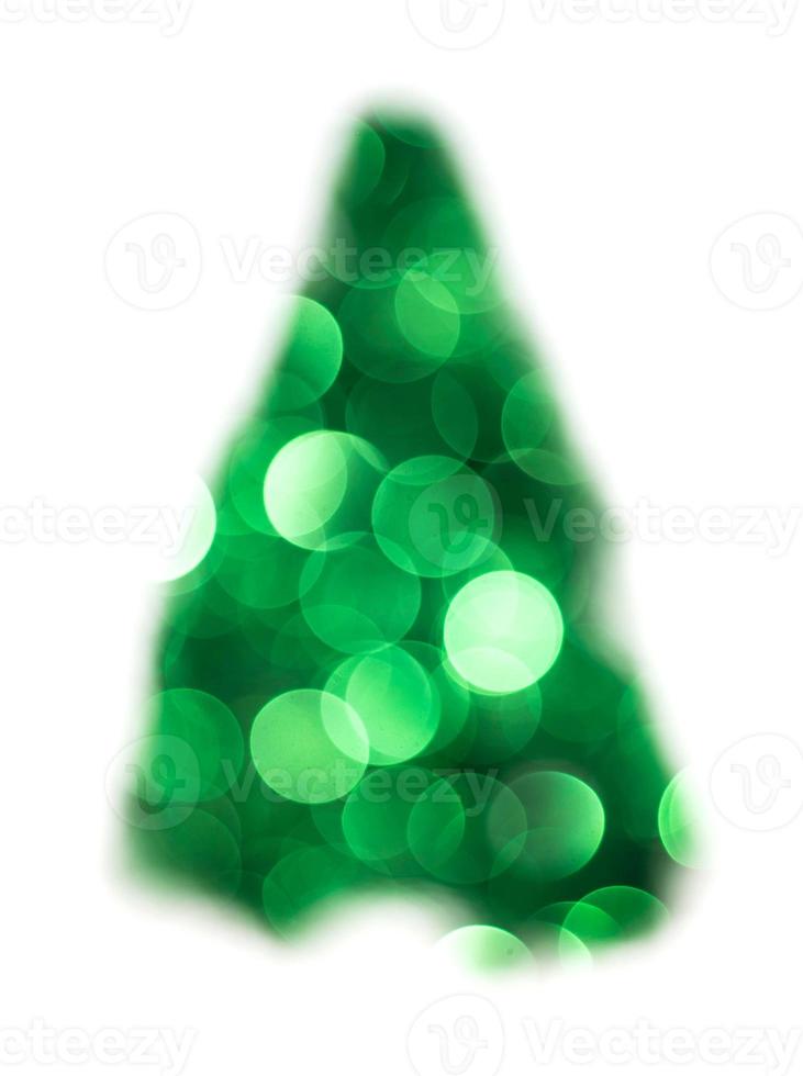 Green Christmas lights fir tree bokeh - A bright bokeh background created by Christmas lights photo