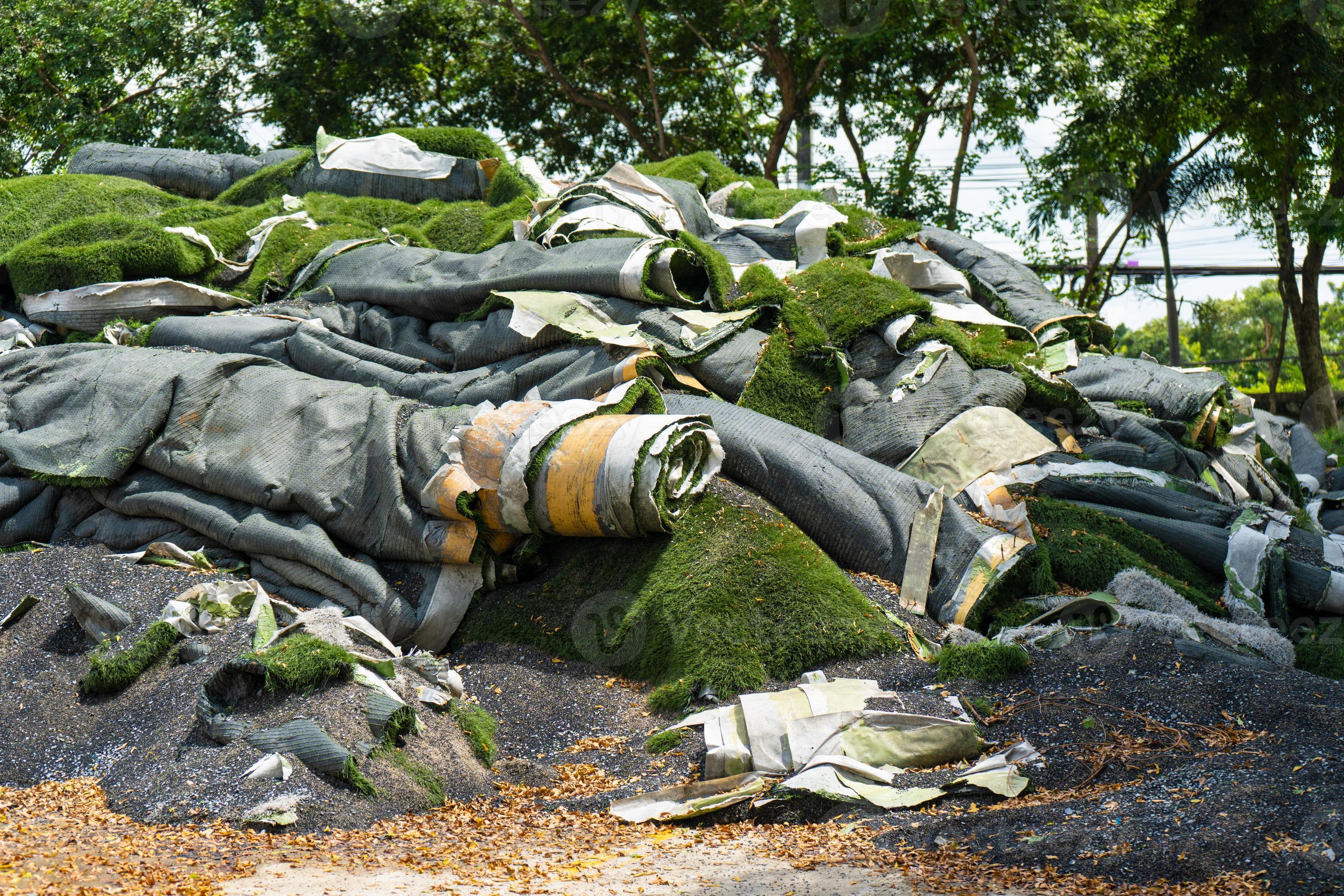 Pile of Artificial grass ,Rolls of synthetic turf removed were awaiting