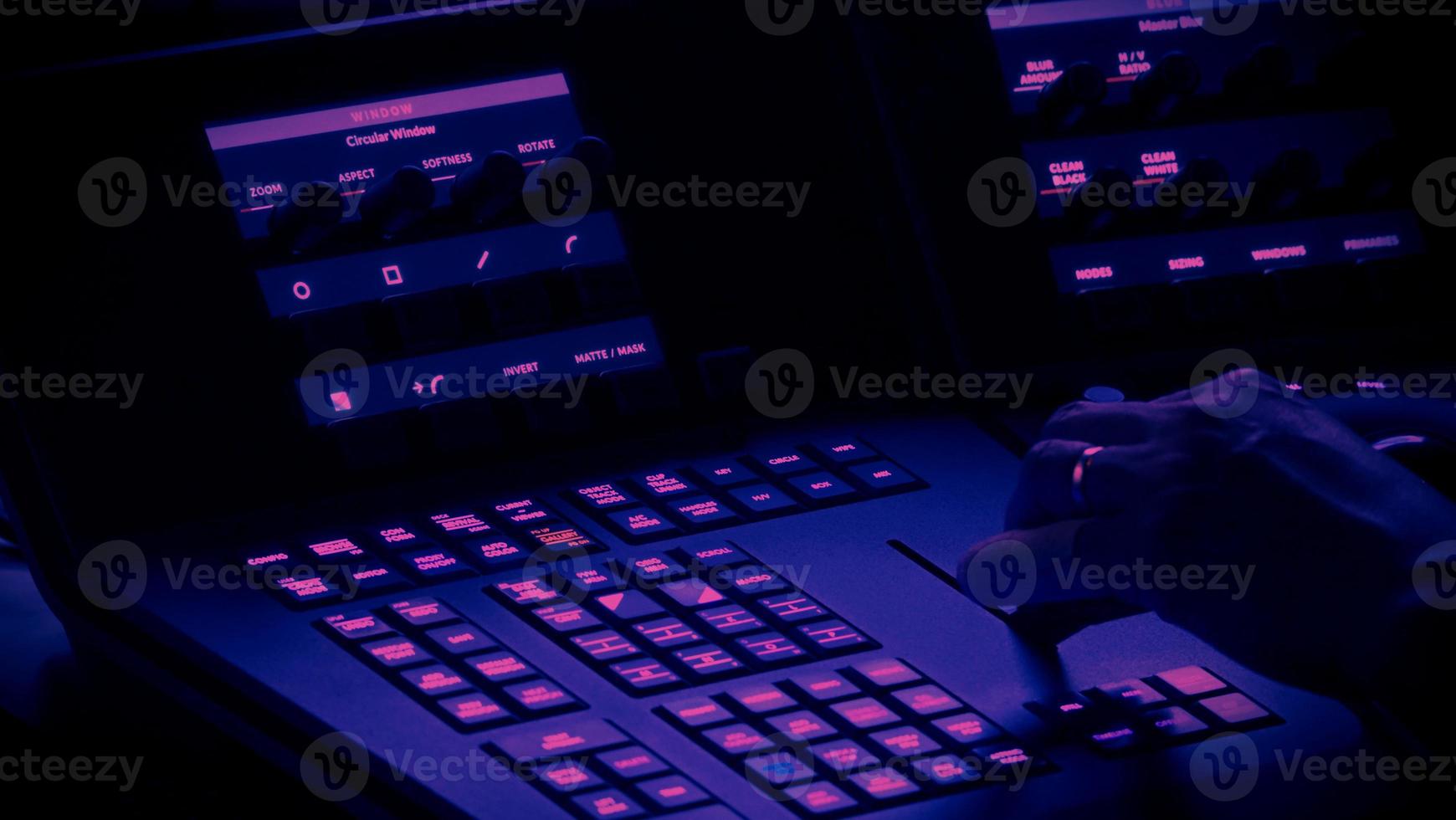 Edit video production control panel in studio. Editor editing and grade film in movie post room. photo