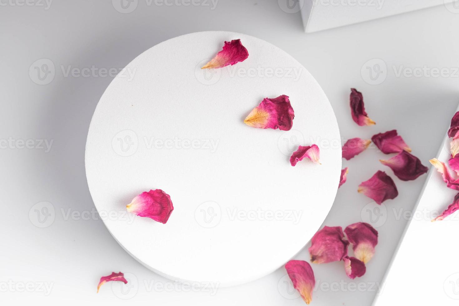 White product stand, mock up on a white background texture background Ideal backdrop for product presentations, exhibitions and mockups. photo