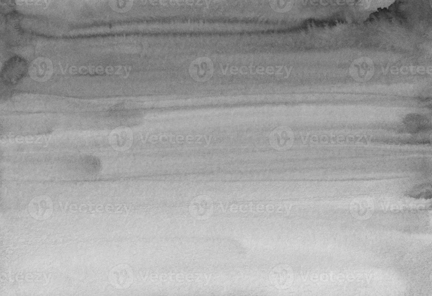 Watercolor light gray gradient background texture. Black and white watercolour backdrop. Grey stains on paper. photo