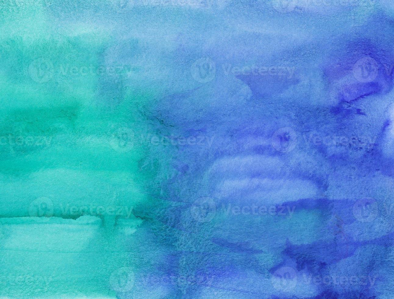 Watercolor blue and turquoise background painting texture. Multicolored watercolour liquid backdrop. Stains on paper. photo