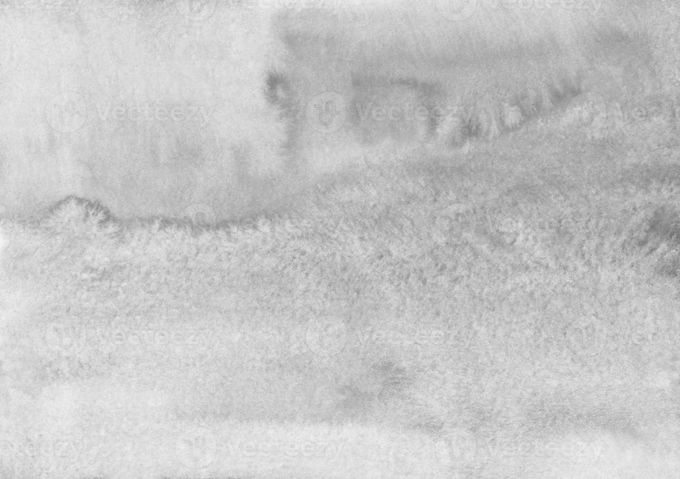 Watercolor light gray background texture. Monochrome stains on paper backdrop overlay. Abstract aquarelle black and white modern painting. photo