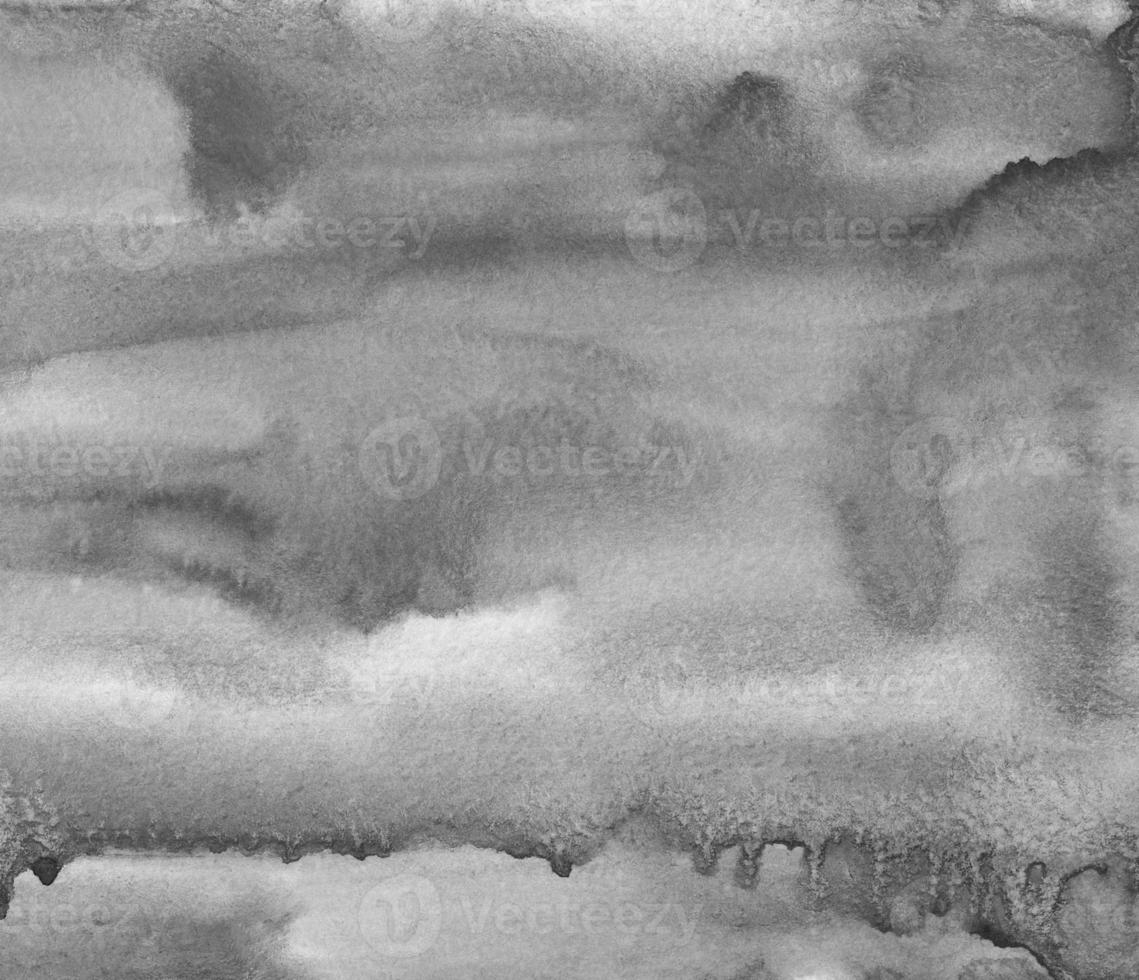 Watercolor calm gray liquid background texture. Monochrome stains on paper backdrop overlay. Abstract black and white aquarelle painting. photo