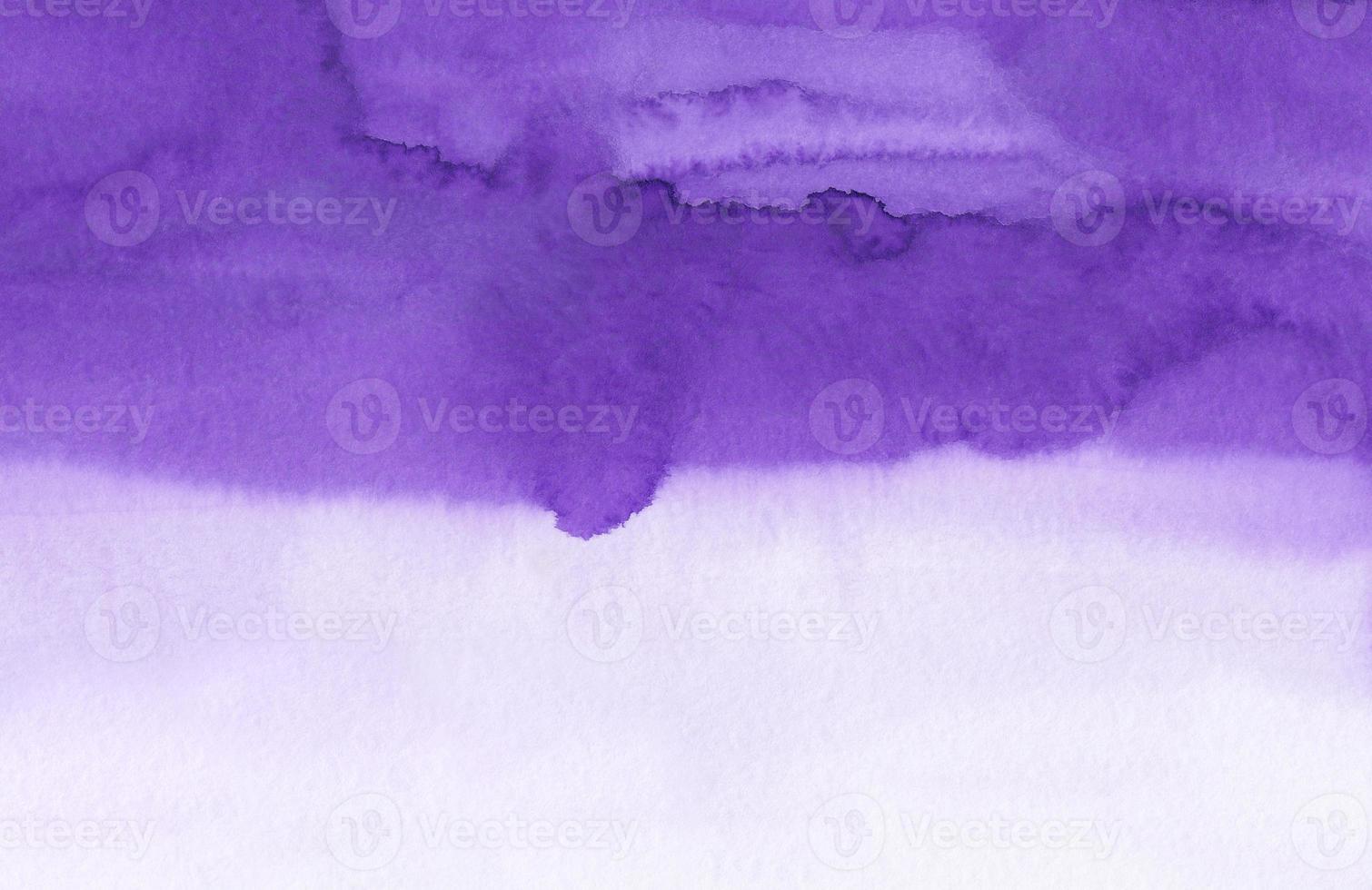 Watercolor violet and white soft background texture. Stains on paper. Aquarelle purple ombre backdrop. photo