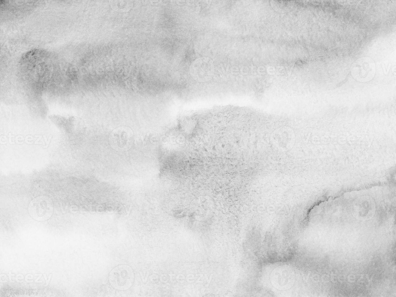 Watercolor light gray and white textured background. Monochrome stains on paper. Abstract liquid painting. photo