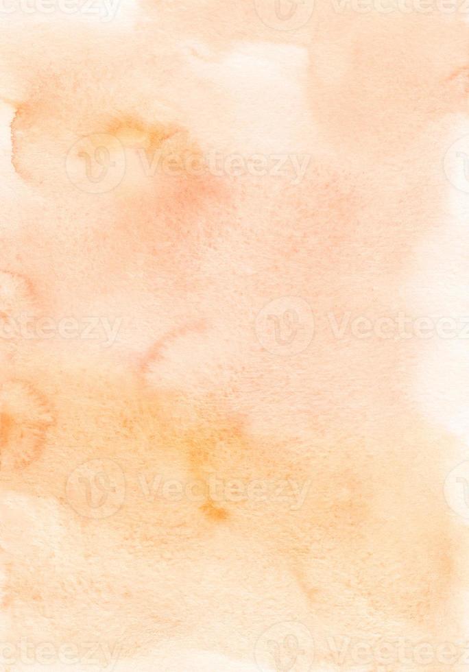 Watercolor pastel peach color background texture. Watercolour backdrop. Light orange stains on paper, hand painted. photo