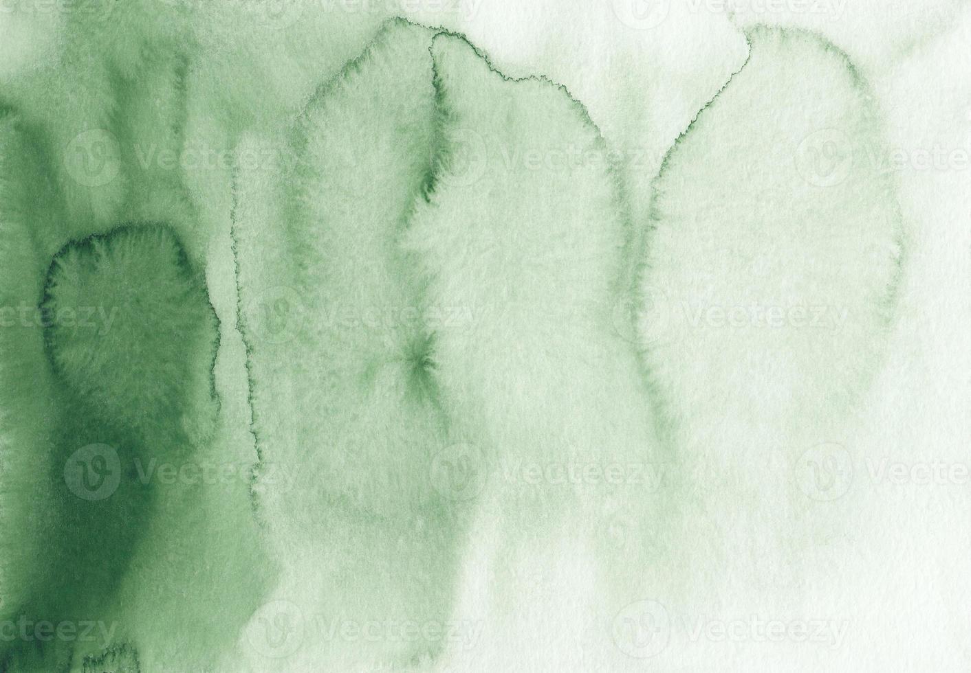 Watercolor green ombre background texture. Green and white gradient backdrop. Watercolour stains on paper, hand painted. Liquid overlay photo