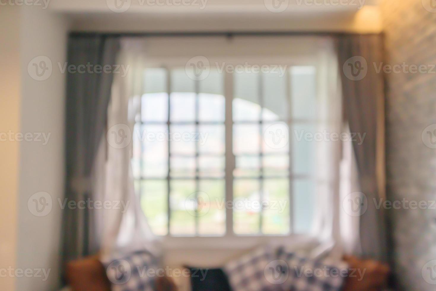 hotel resort living room interior design with large windows abstract blur background photo