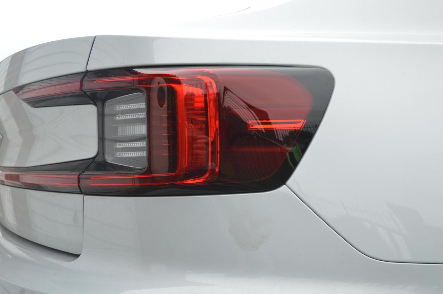 Rear Lights on a White Car 12566072 Stock Photo at Vecteezy