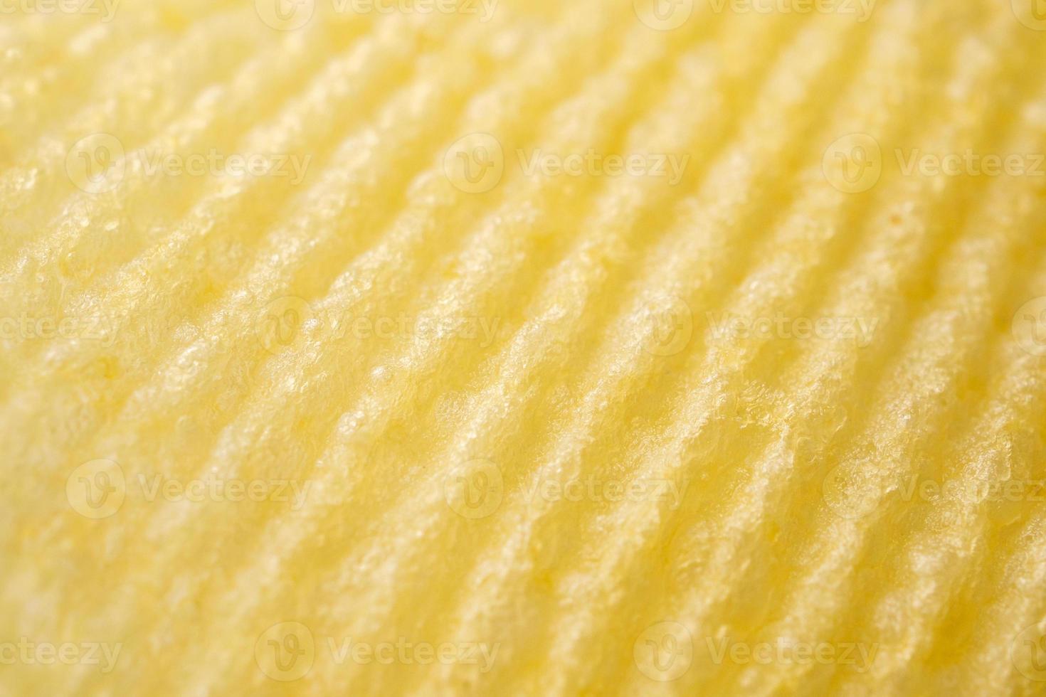 Potato chip texture background closeup photo