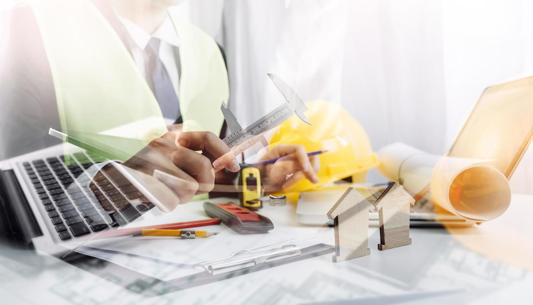 Scene of industrial engineers discussion, Construction architect with huge industry as a background, Concept of engineer project planning, professional teamwork. Selective focused. photo