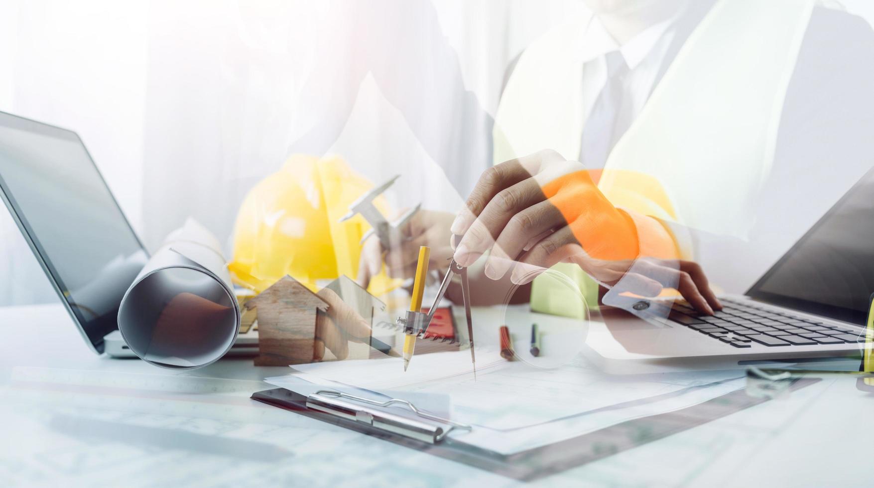 Scene of industrial engineers discussion, Construction architect with huge industry as a background, Concept of engineer project planning, professional teamwork. Selective focused. photo
