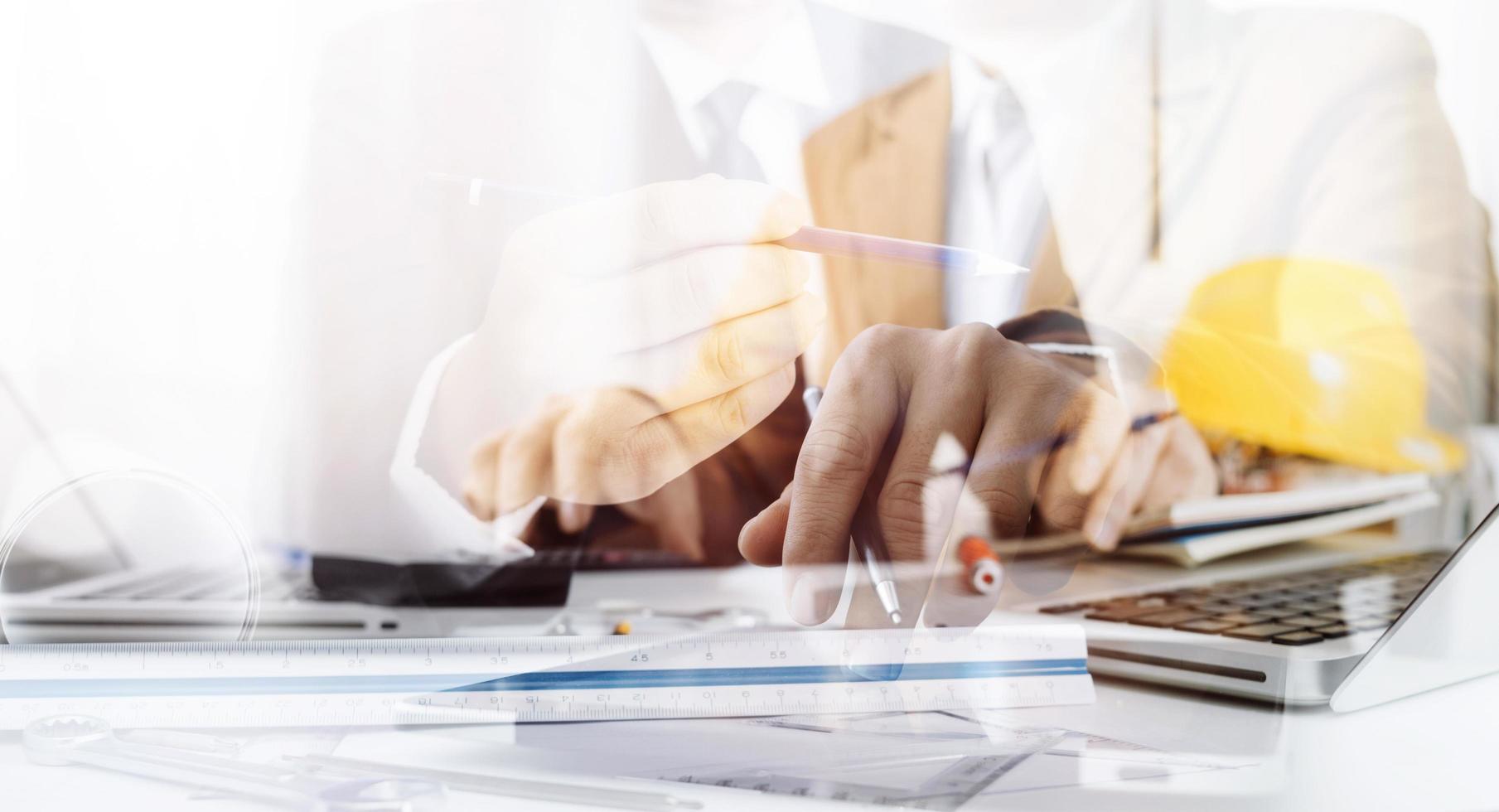 Scene of industrial engineers discussion, Construction architect with huge industry as a background, Concept of engineer project planning, professional teamwork. Selective focused. photo