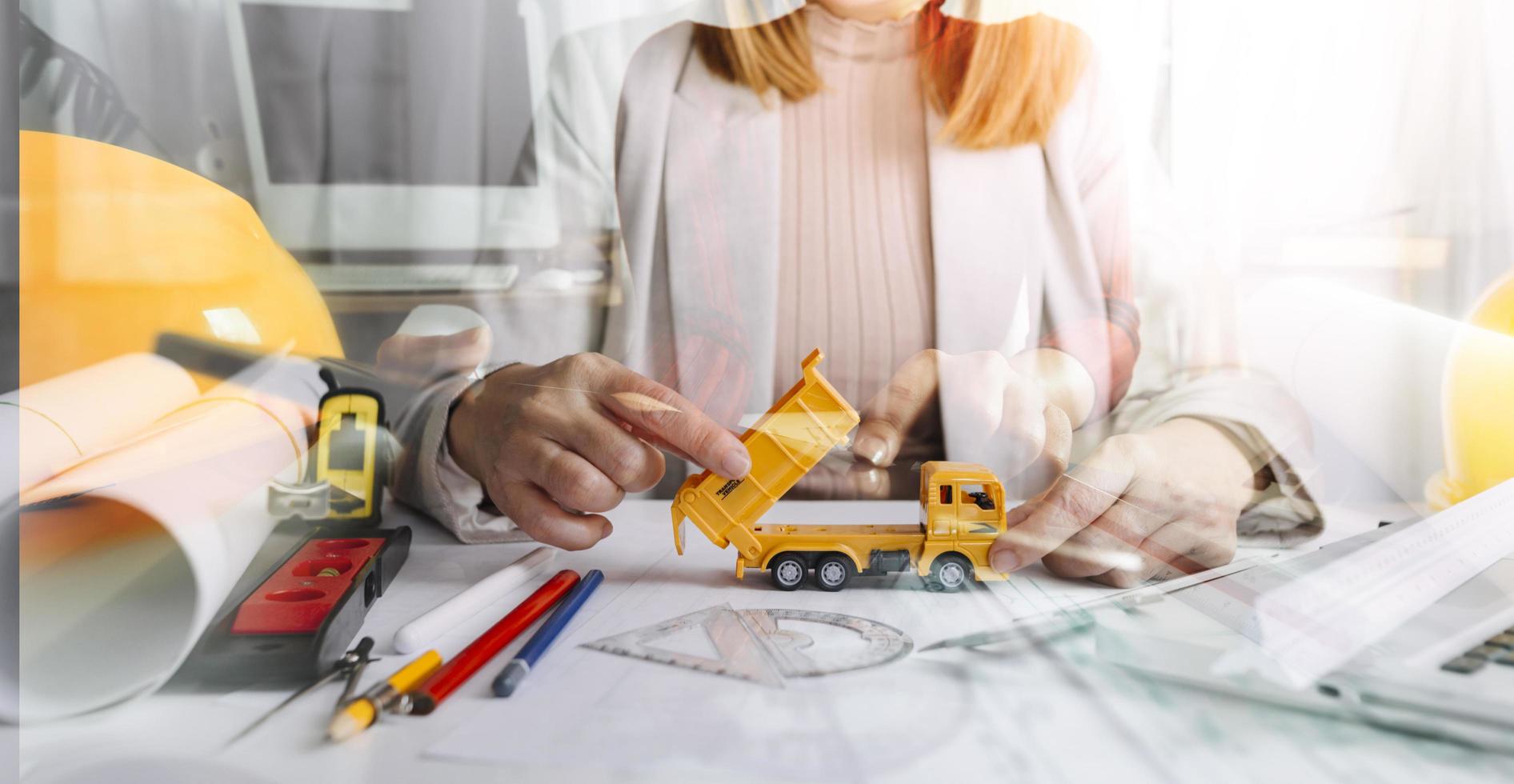 Scene of industrial engineers discussion, Construction architect with huge industry as a background, Concept of engineer project planning, professional teamwork. Selective focused. photo