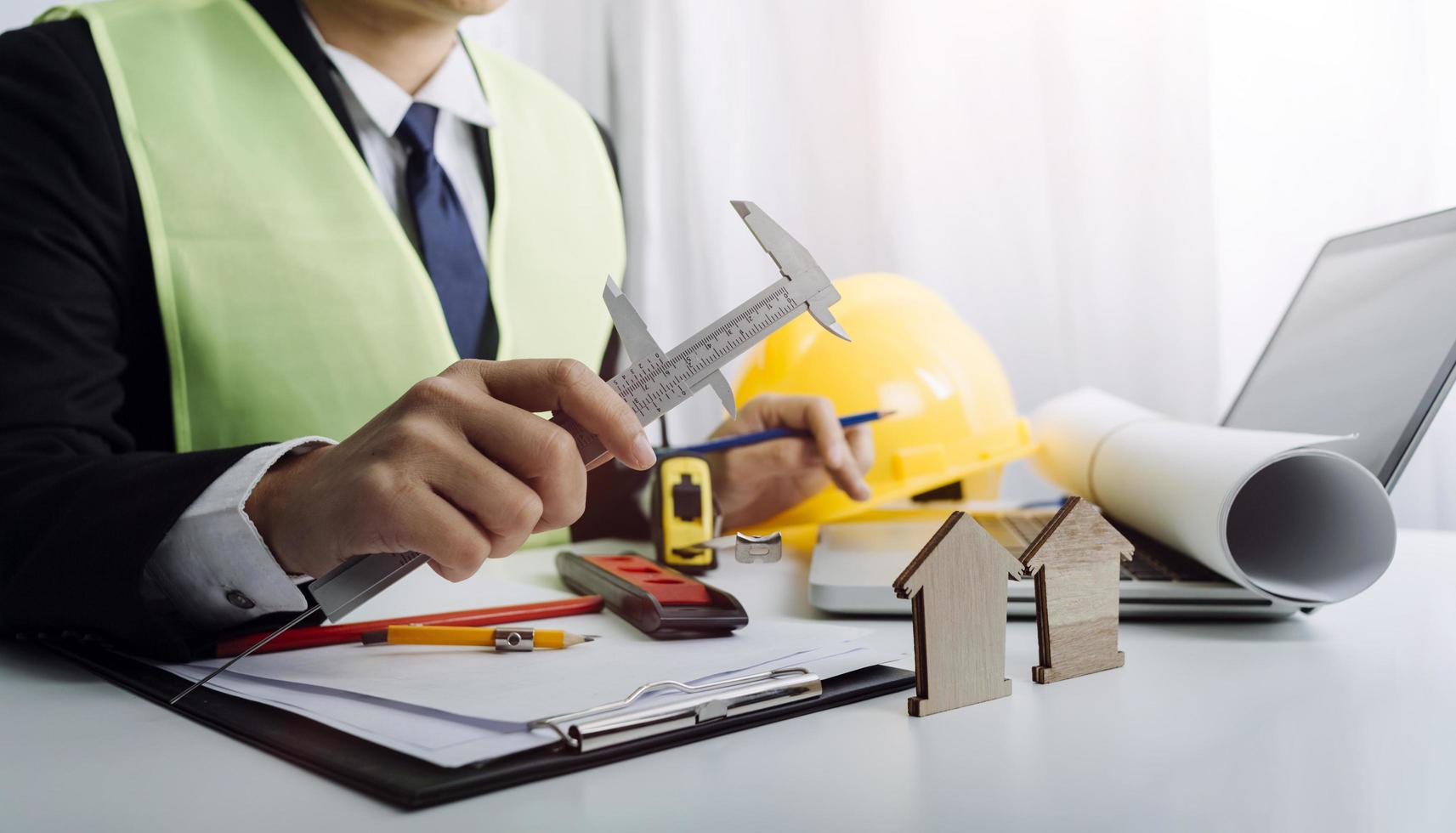 Scene of industrial engineers discussion, Construction architect with huge industry as a background, Concept of engineer project planning, professional teamwork. Selective focused. photo