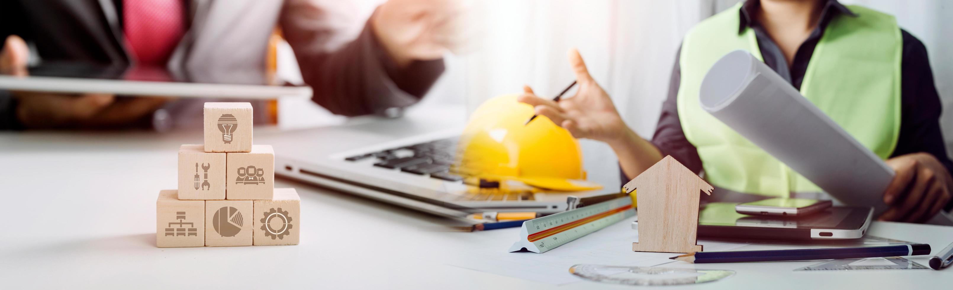 Scene of industrial engineers discussion, Construction architect with huge industry as a background, Concept of engineer project planning, professional teamwork. Selective focused. photo