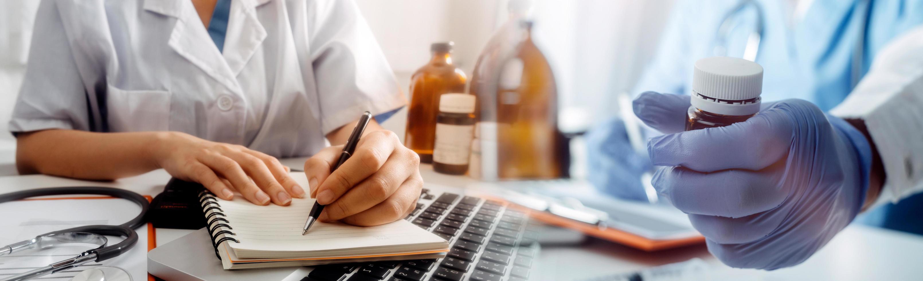 Medicine doctor and stethoscope touching icon medical network connection with modern interface on digital tablet in hospital background. Medical technology network concept photo