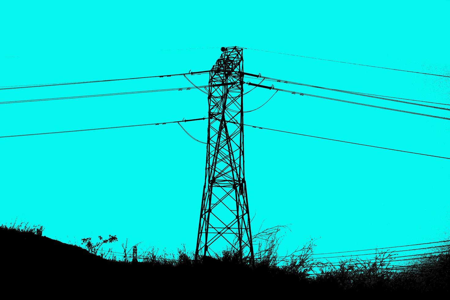 silhouette electric towers supporting copper cables to transport electric energy photo