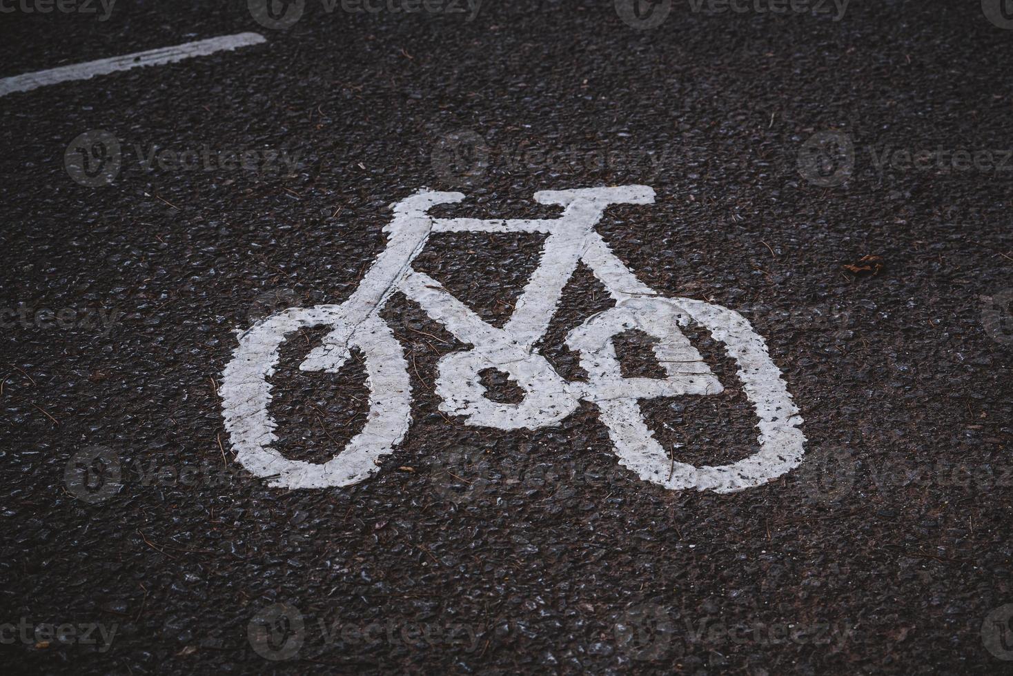 Bicycle sign on floor photo