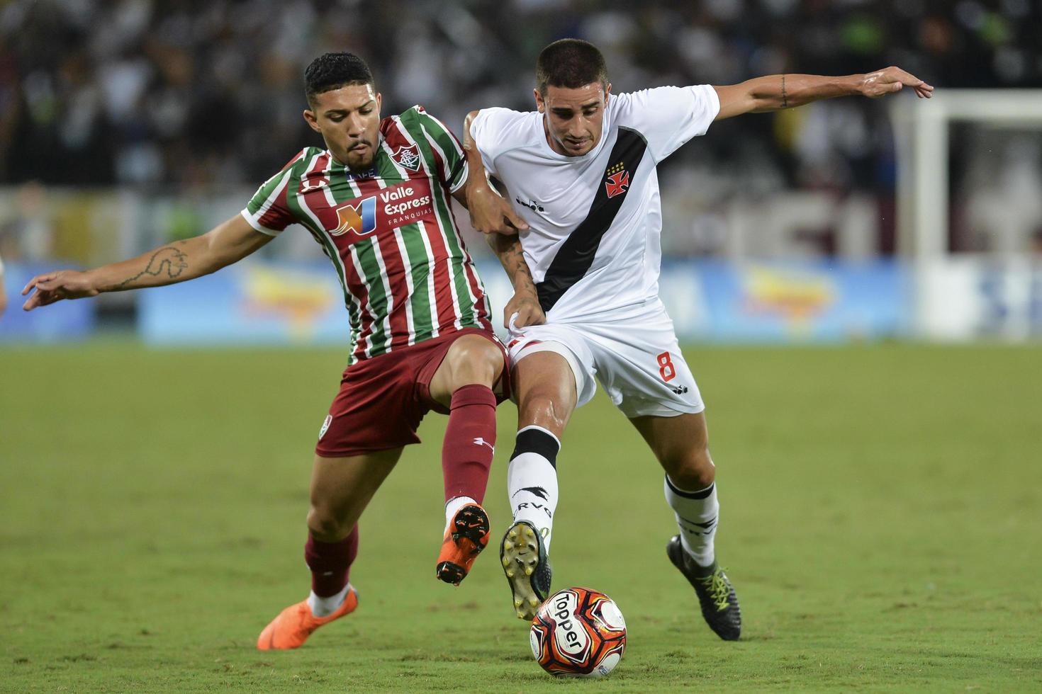 Rio, Brazil - march 07, 2018 -  Douglas and Thiago Galhardo player in match between Vasco and Fluminense by the Carioca Championship in Nilton Santos Stadium photo