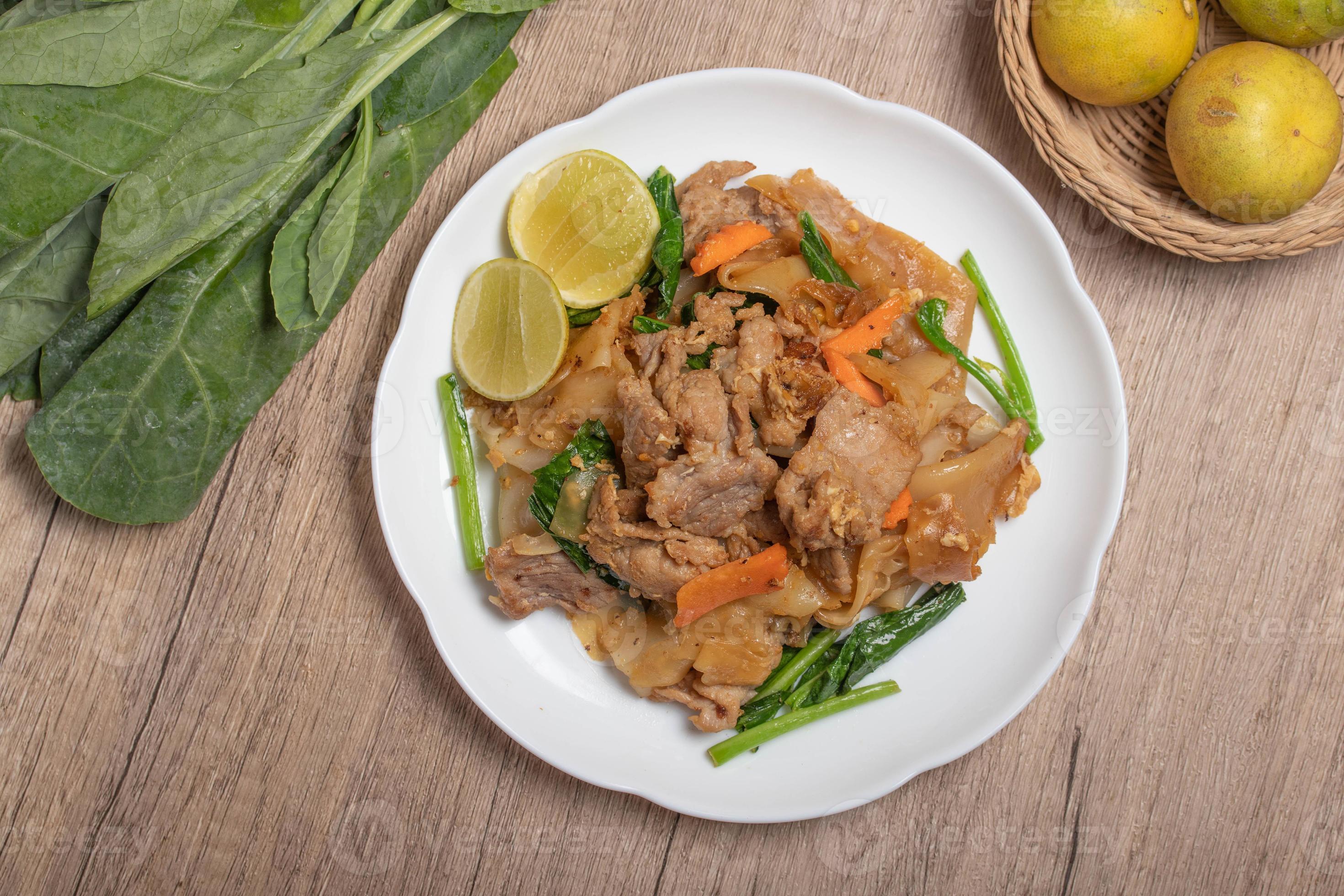 Stir-fried Rice Noodles with Soy Sauce and Pork 12570202 Stock Photo at