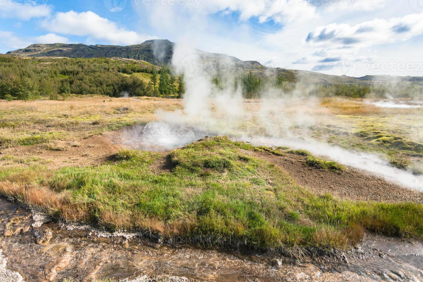 hot spring in Haukadalur geyser area in Iceland photo