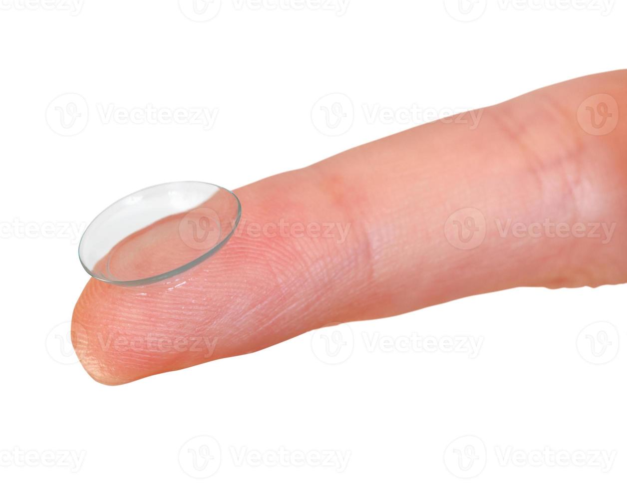 contact lens on finger close up isolated photo