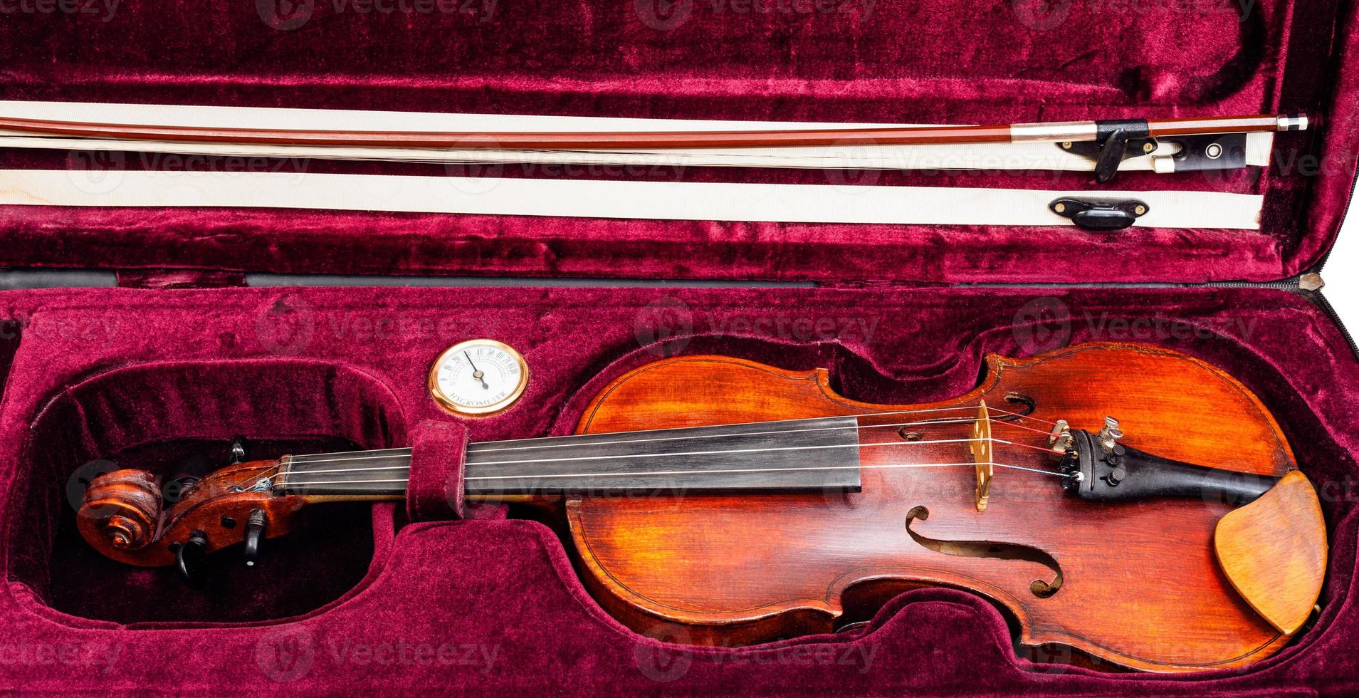 classic violin with bow in red velvet case photo