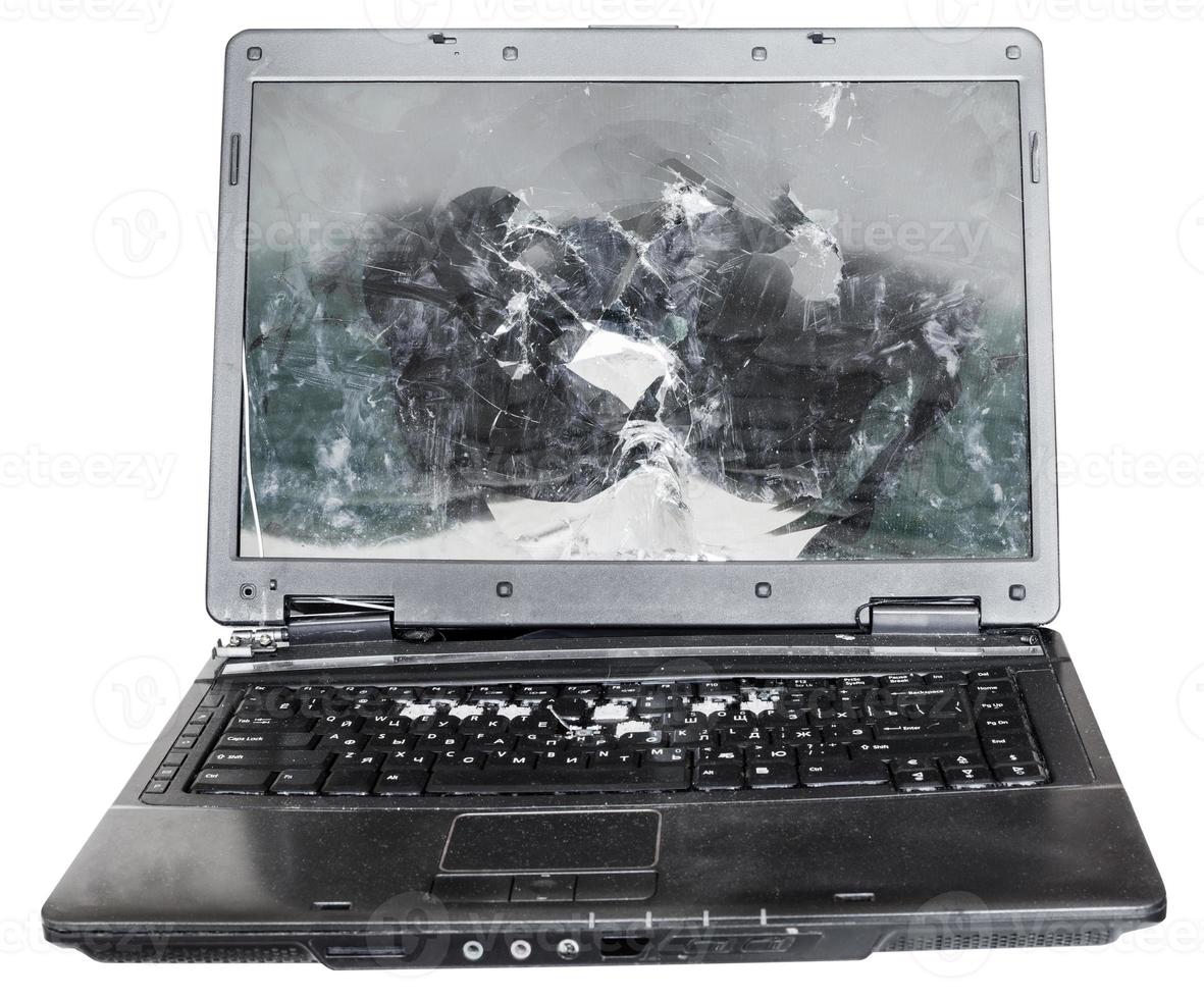 direct view of old broken laptop isolated photo