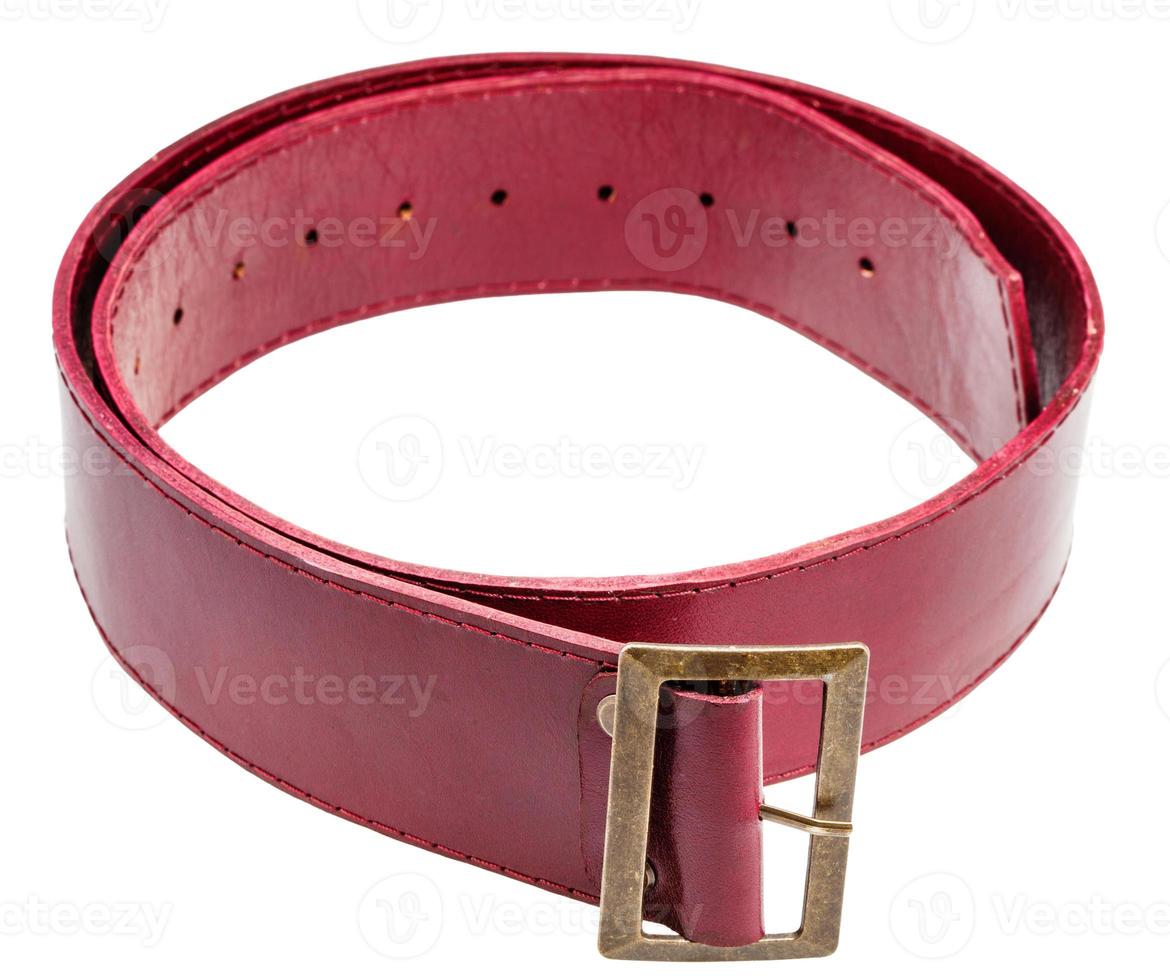 red belt with brass buckle isolated on white photo