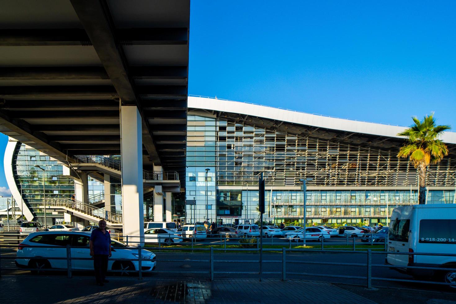 Sochi, Russia - July 28, 2022 Urban landscape with Adler railway station photo