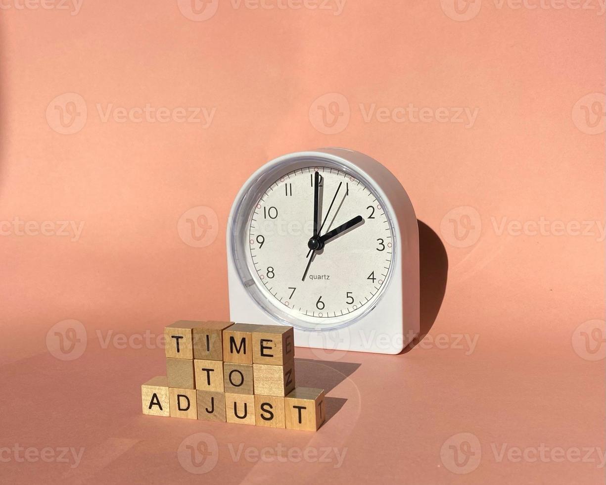 Time to adjust adjusting or changing the time on white clock. Time