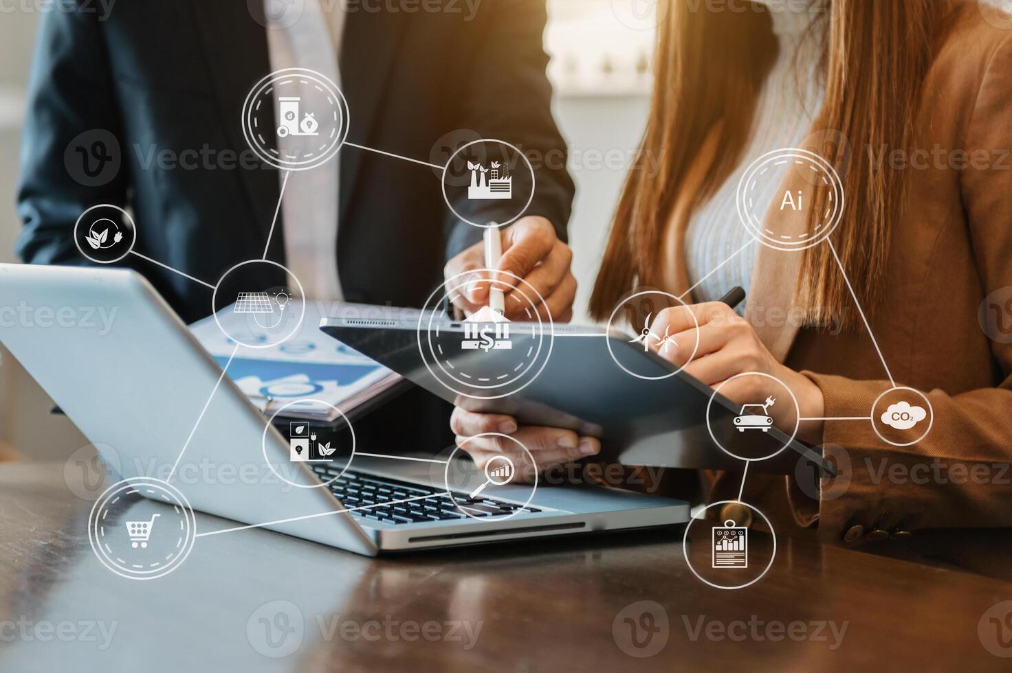 Business team working virtual modern smartphone to reduce CO2 emissions carbon footprint climate change to limit global warming.Sustainable development and green business concept. at office photo