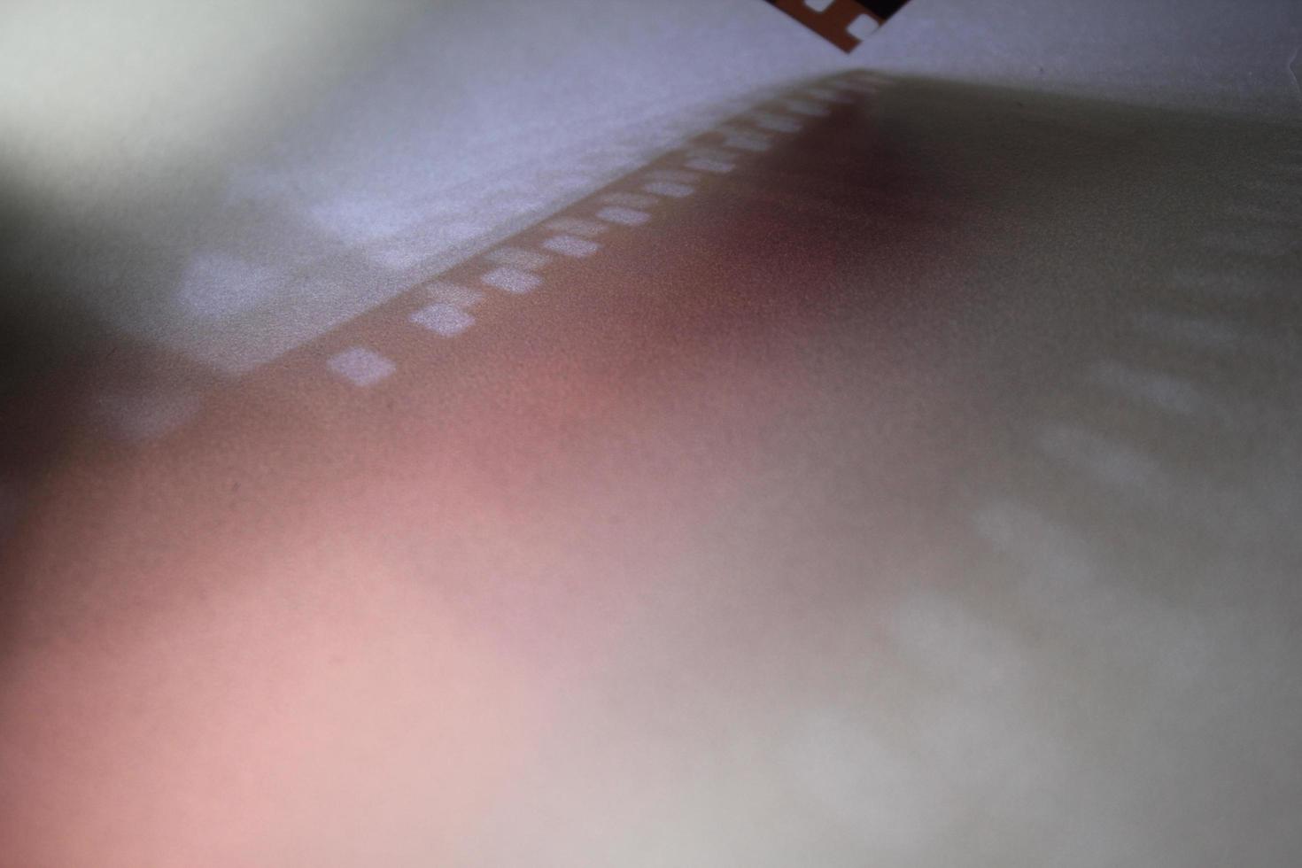Shading light from photographic film intensity on a silver background photo