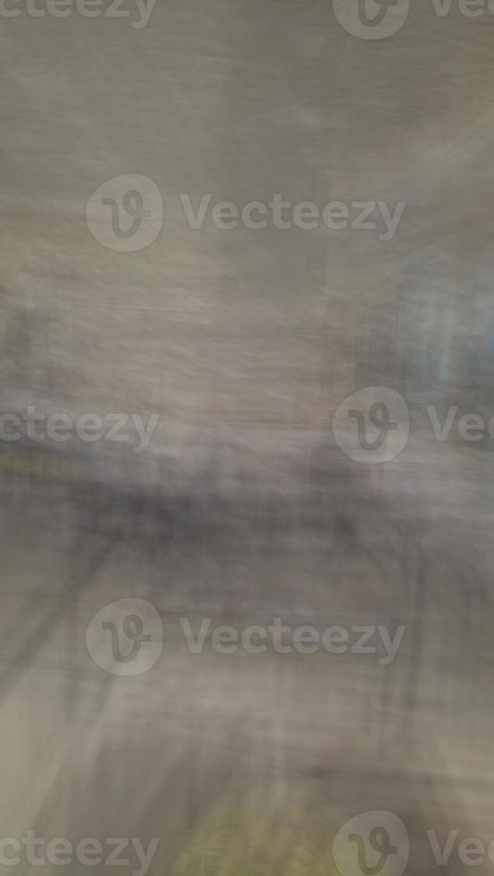Abstract blur background with brown gray, black, white and earth tones. photo