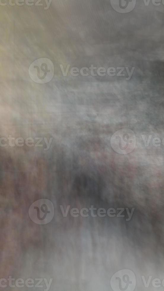Abstract blur background with brown gray, black, white and earth tones. photo