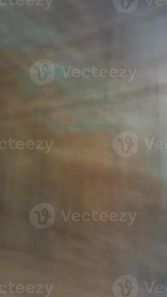 Abstract blur background with brown gray, black, white and earth tones. photo