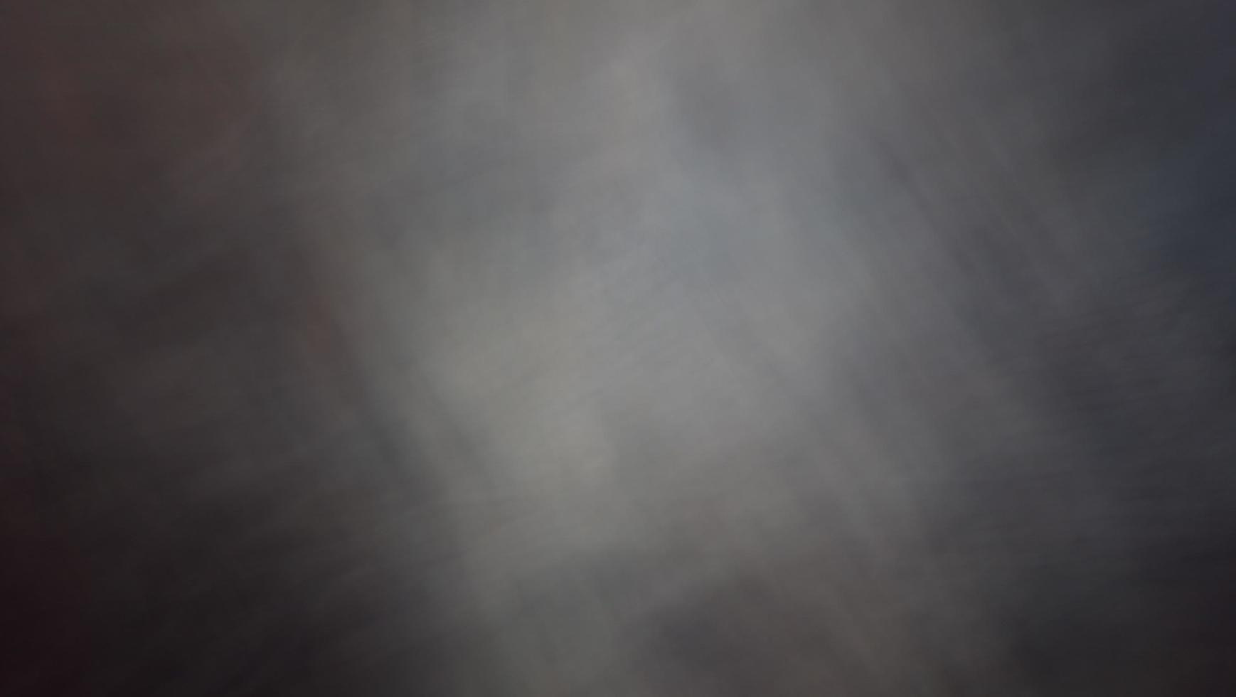 Abstract blur background with brown gray, black, white and earth tones. photo