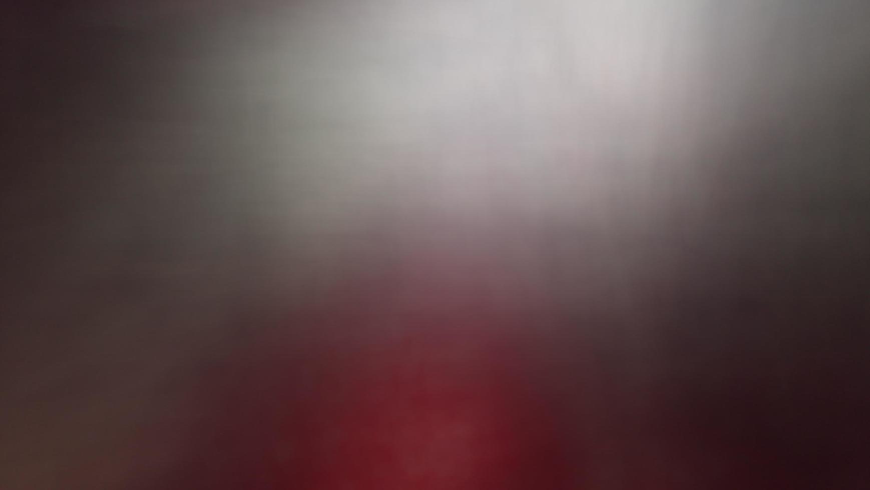 Abstract blur background with gray-brown, black, white, red and earth tones. photo