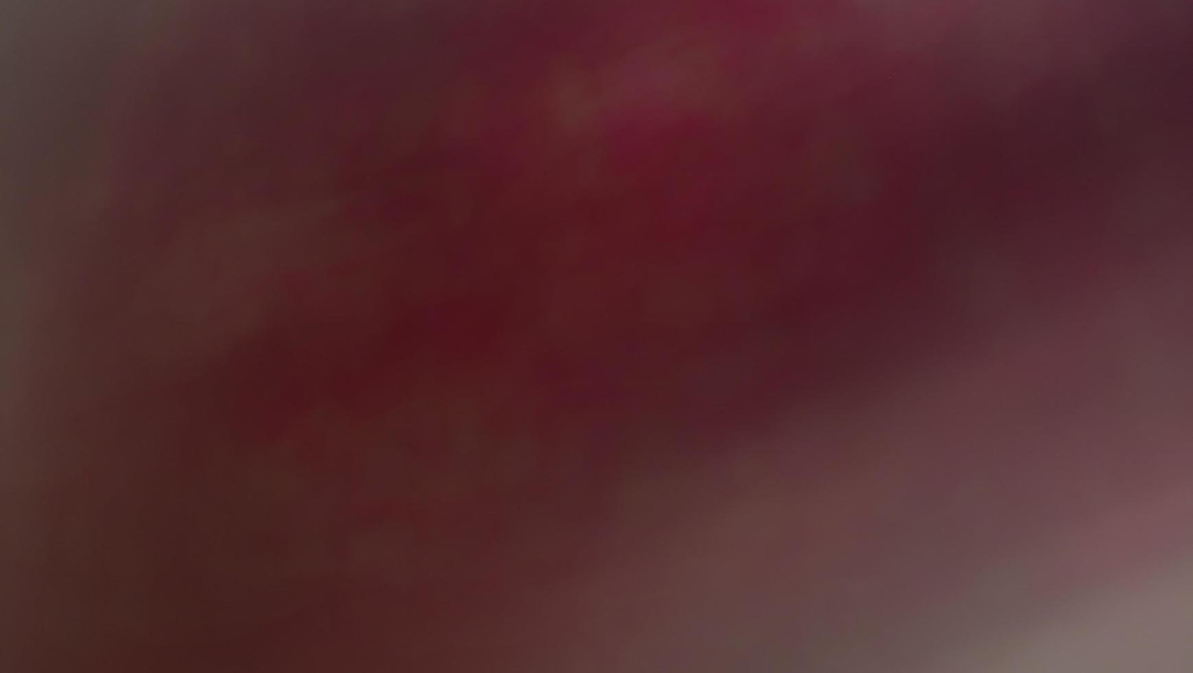 Abstract blur background with gray-brown, black, white, red and earth tones. photo