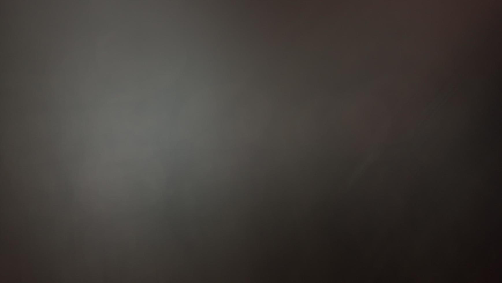 Abstract blur background with brown gray, black, white and earth tones. photo