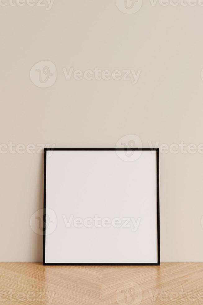 Clean and minimalist front view square black photo or poster frame mockup leaning against wall on wooden floor. 3d rendering.